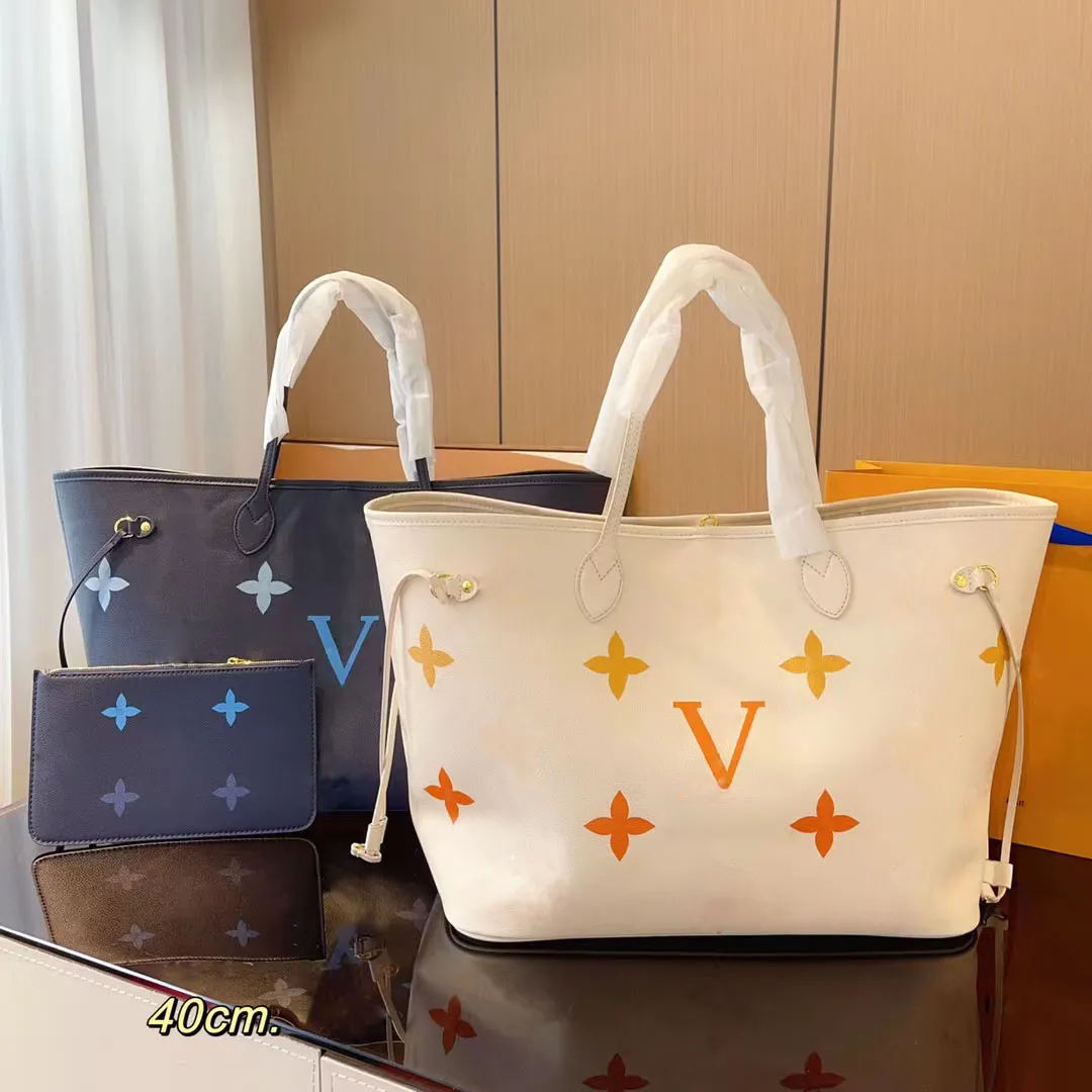 Bolsa de bolsa de bolsa feminina popular com bolsa de compras ombro bola de ombro de ombro de couro de moda de grande capacidade de personalidade clássica em bolsa de embreagem alfabetista