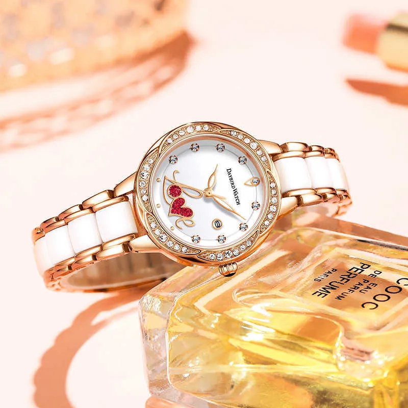 2023 Nieuwe dameshorloge -liefde serie warme keramische stalen band kalender glow quartz dun premium horloge
