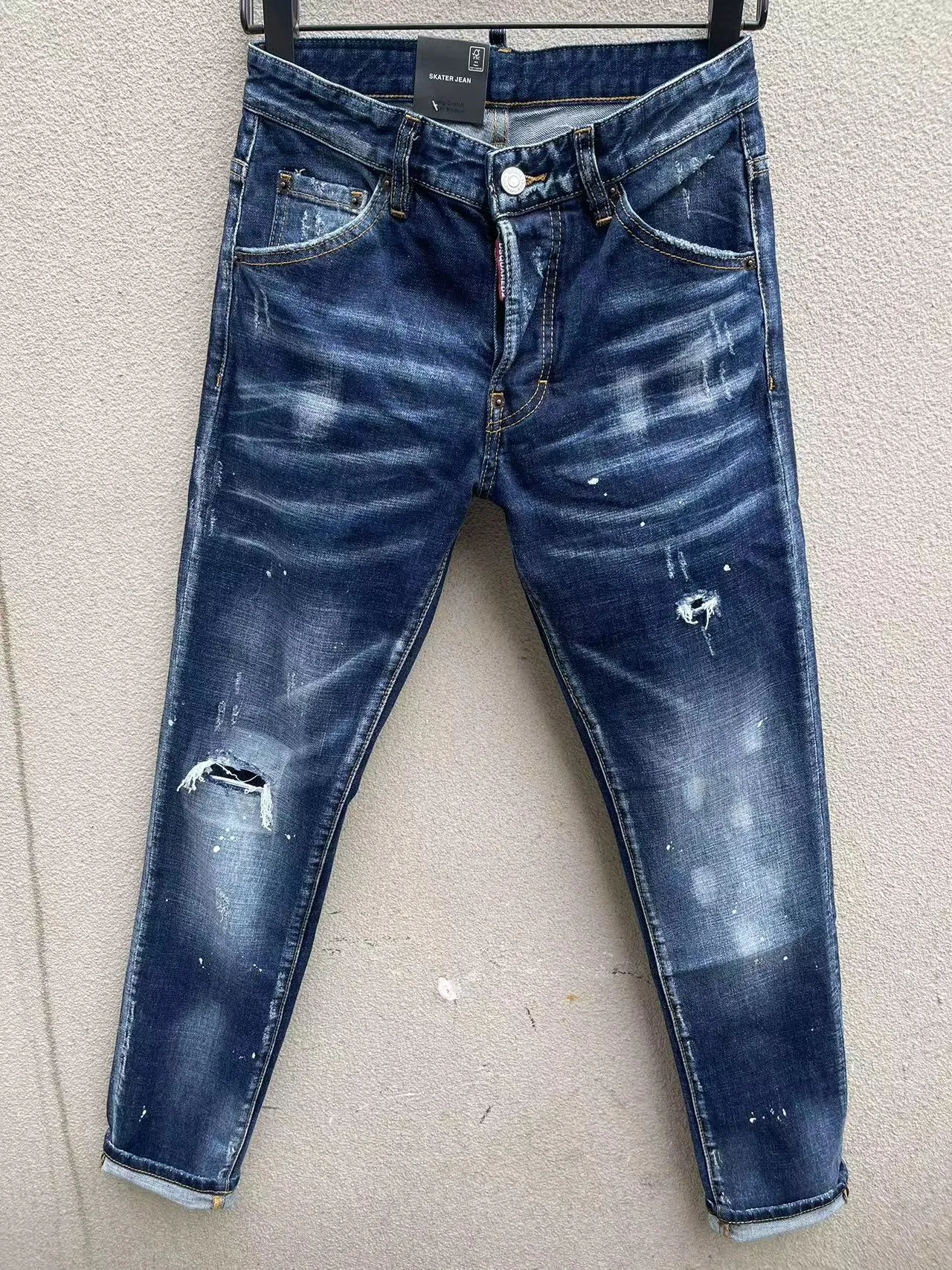 2023 D088 ​​Coolguy Man Jeans Microelástico apresenta uma decoração de bordado com zíper de alto grau Tag de couro pequeno tag de couro