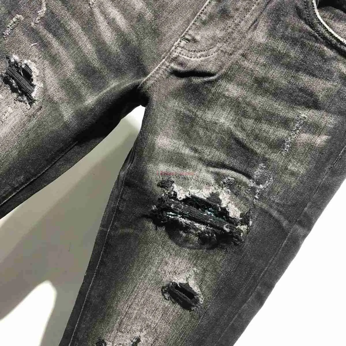Abbigliamento firmato Jeans Amires Pantaloni in denim Abbigliamento da uomo alla moda Jeans strappati Amies con toppe lavate a vita medio bassa in