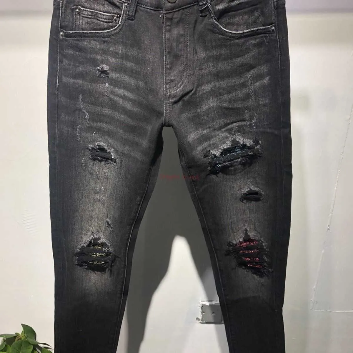 Jeans neri strappati uomo zara best sale