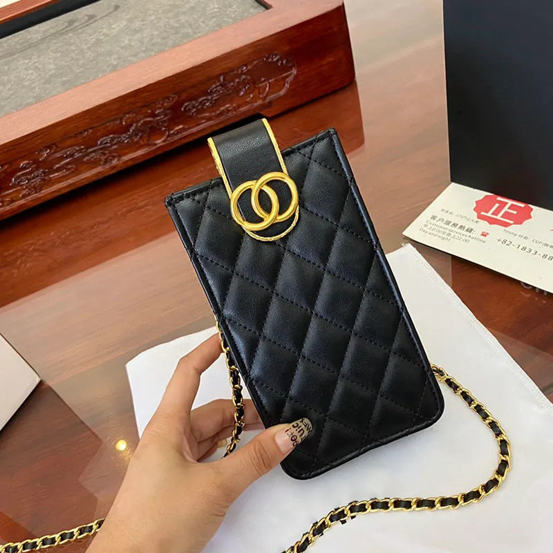 Black designer bag with gold chain shop