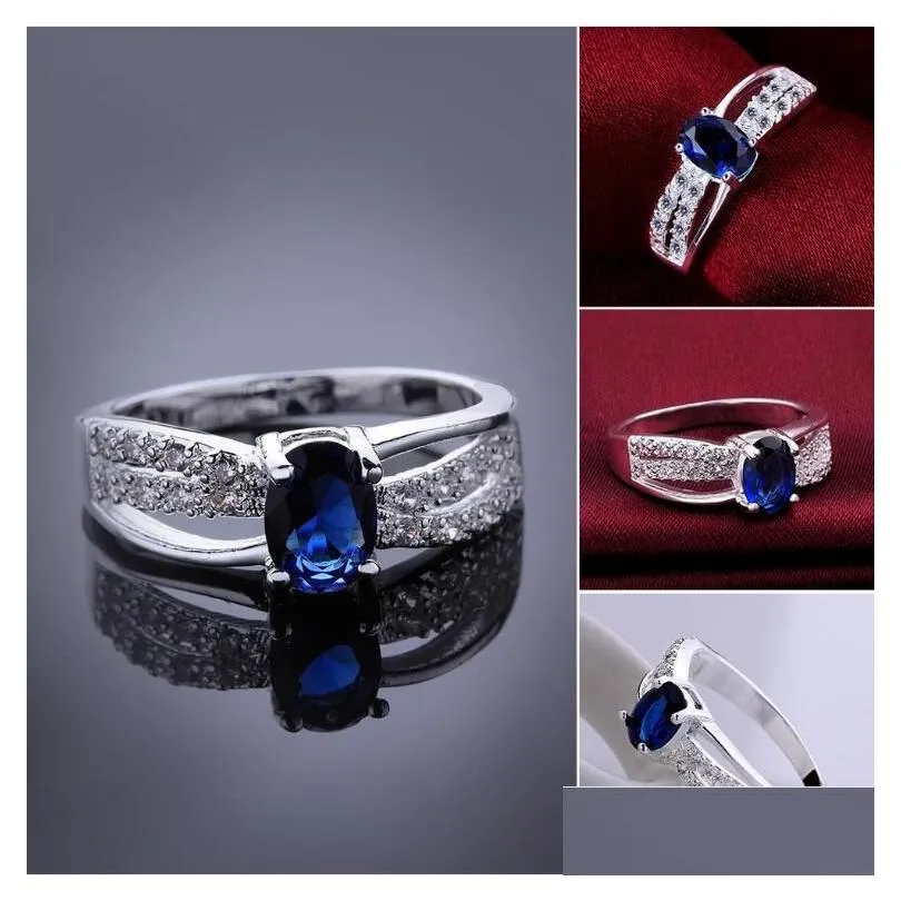 Con pietre laterali Donna Sterling Sier placcato anello zircone blu cavo Gssr568 Fashion 925 Plate Rings Drop Delivery Jewelry Dh56X