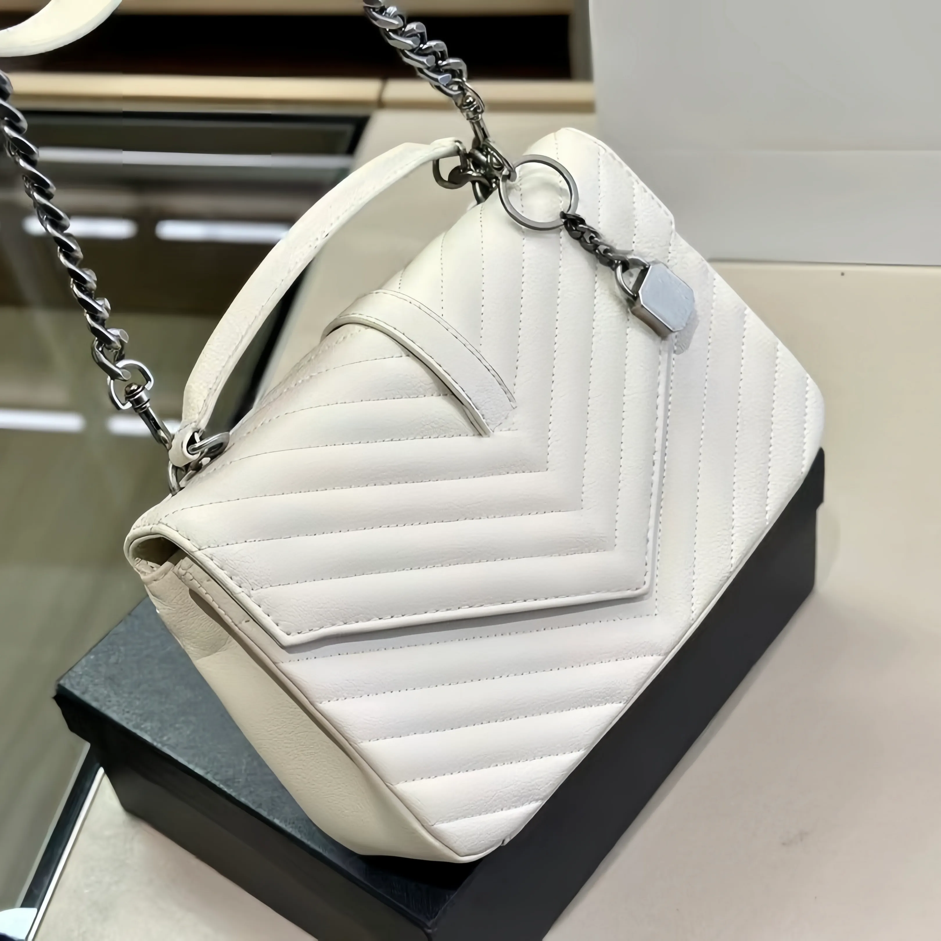 Cream designer bag top