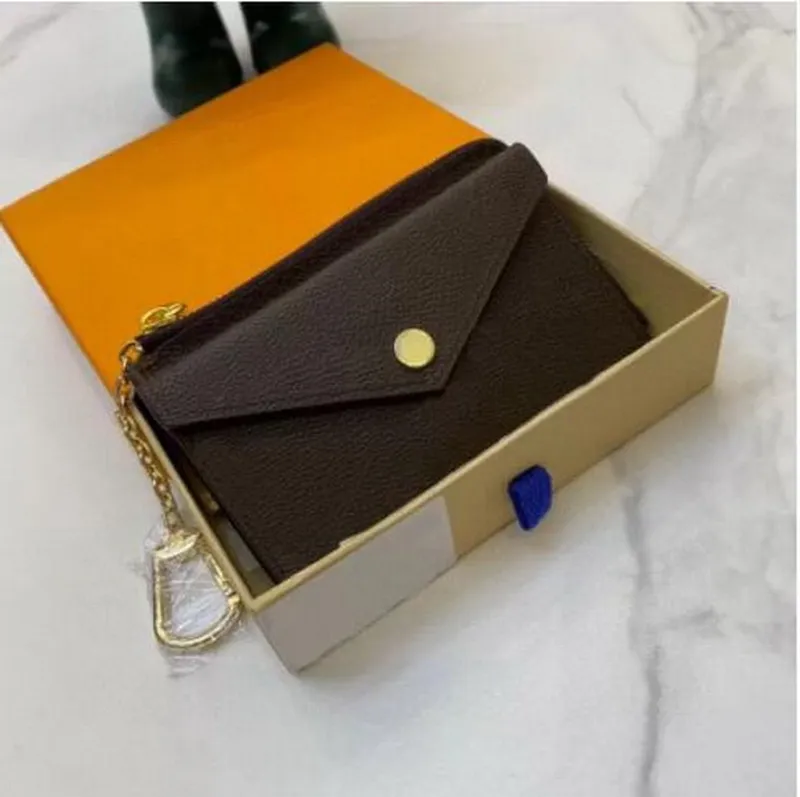 Hig Quality 2023 Luxury Design Portable Key P0uch Кошелек Classic Man/Women Coin Surwem Bag Сумка с пышной сумкой и подарочной коробкой коричневая цветочная кожа