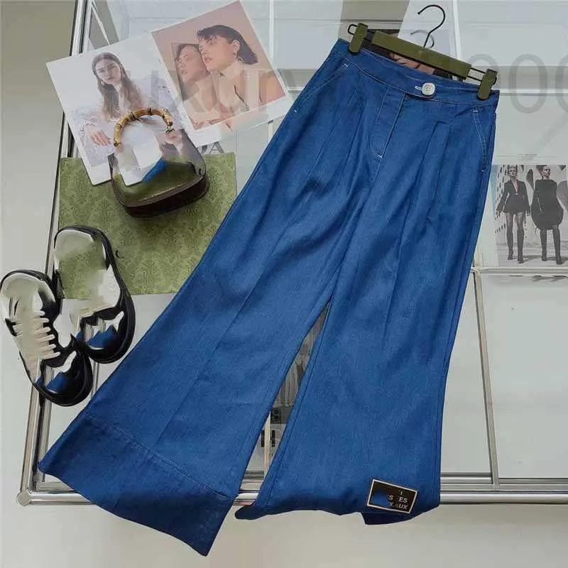 Kvinnors jeans designer 2023 vår/sommar ny byxa bokstavsdekoration hög midje stil kändis mikro la nio poäng fu54