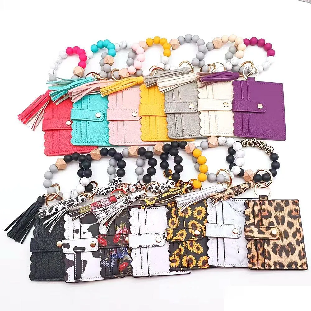 Porte-clés Longes Pu Gland Carte Sac Pendentif Porte-clés Sile Perlé Bracelet Femmes Portable Portefeuille Drop Delivery Mode Accessoire Dhgri