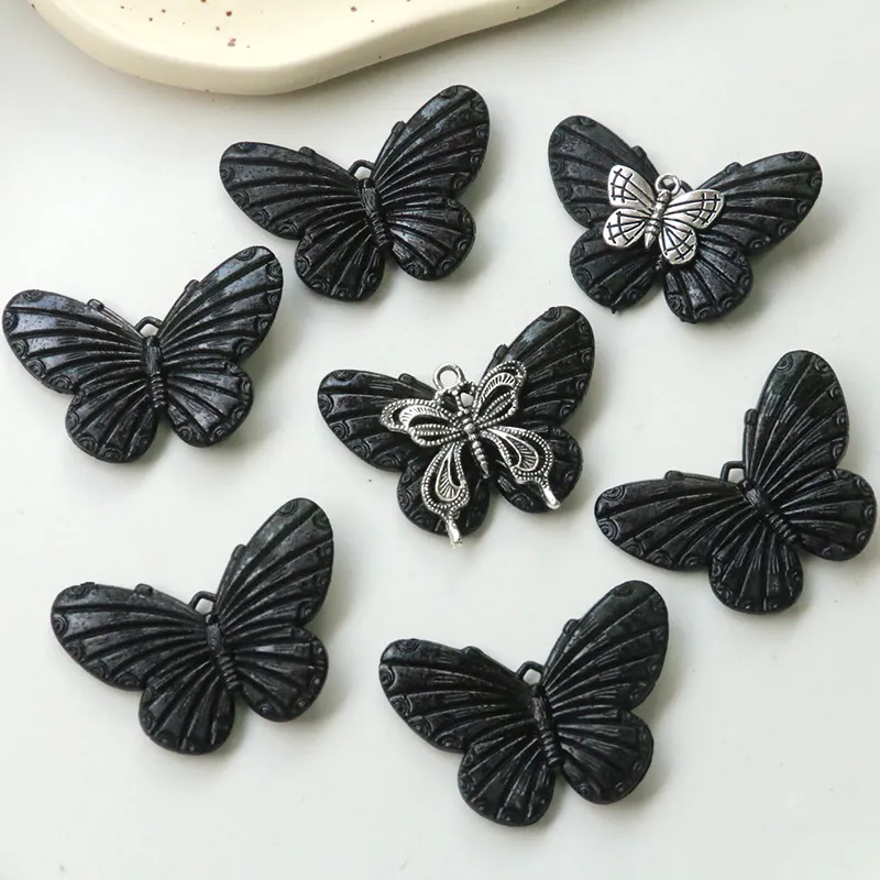 10 unids/pack 32x42mm acrílico negro mariposa encantos Cool gótico pendiente llavero colgantes DIY Animal accesorio para joyería hacer