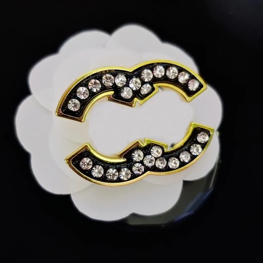 Designer brooches online hotsell