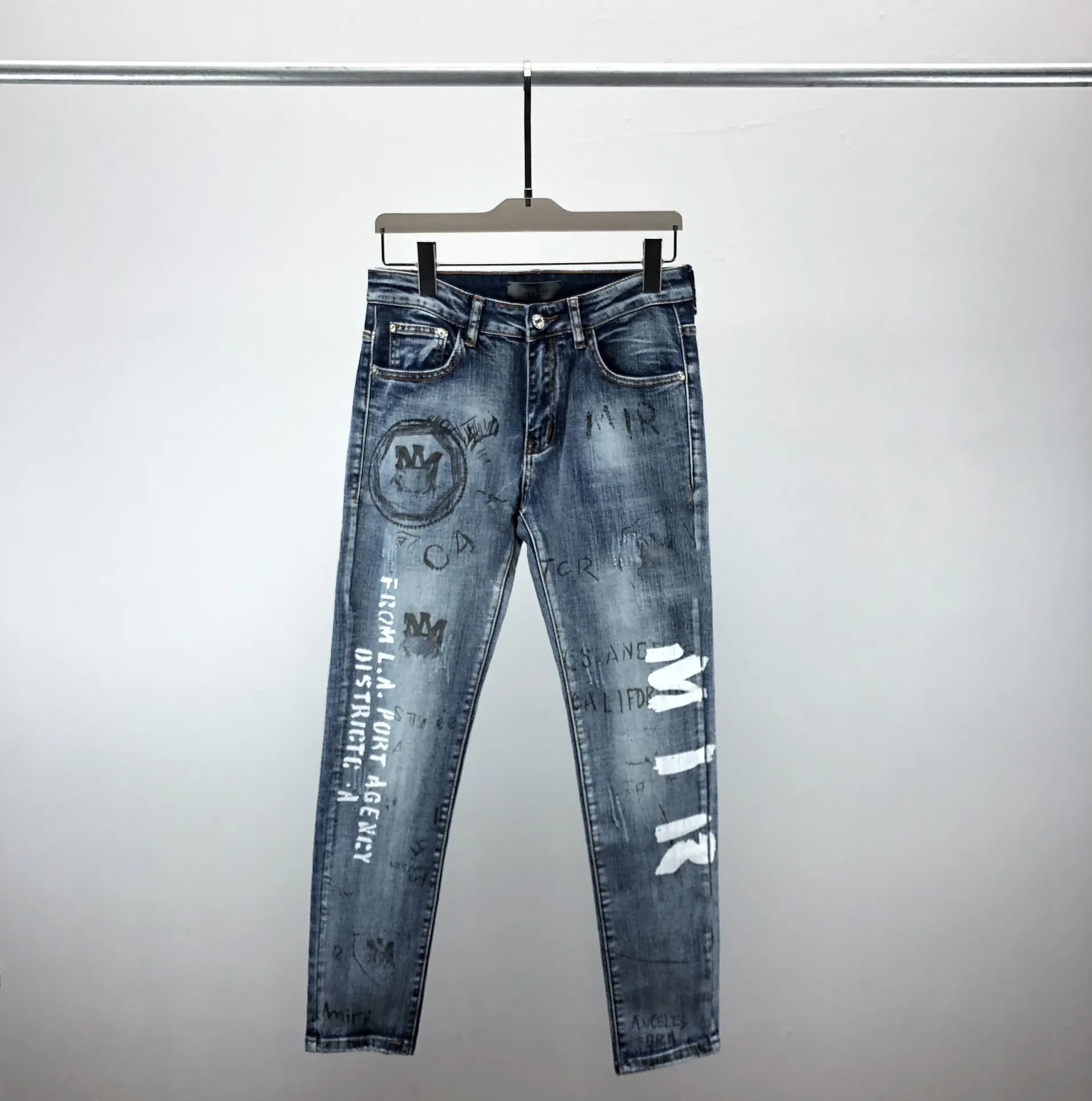 Nuevo diseñador para hombre Jeans Pantalones pitillo Casual Luxury Jeans Hombres Moda Distressed Ripped Slim Motocicleta Moto Biker Denim Hip Hop PantsQ12