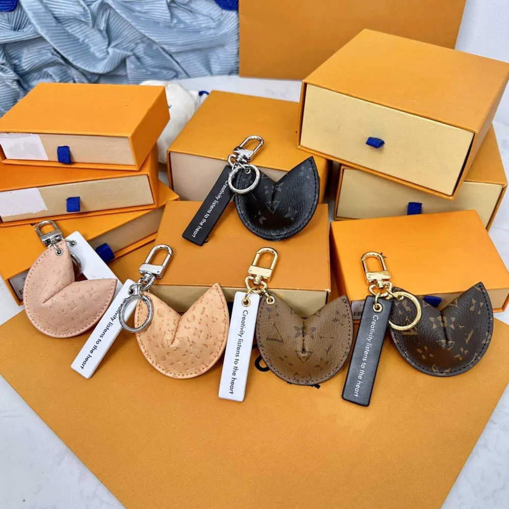 Nyckelringar Lanyards med Box Fortune Cookie Bag Hanging Keychain Car Flower Charm smycken Kvinnor Män gåvor Fashion Pu Leather Key Chain Motion Design 74ESS