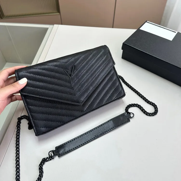 Monogram envelope shoulder bag hot sale