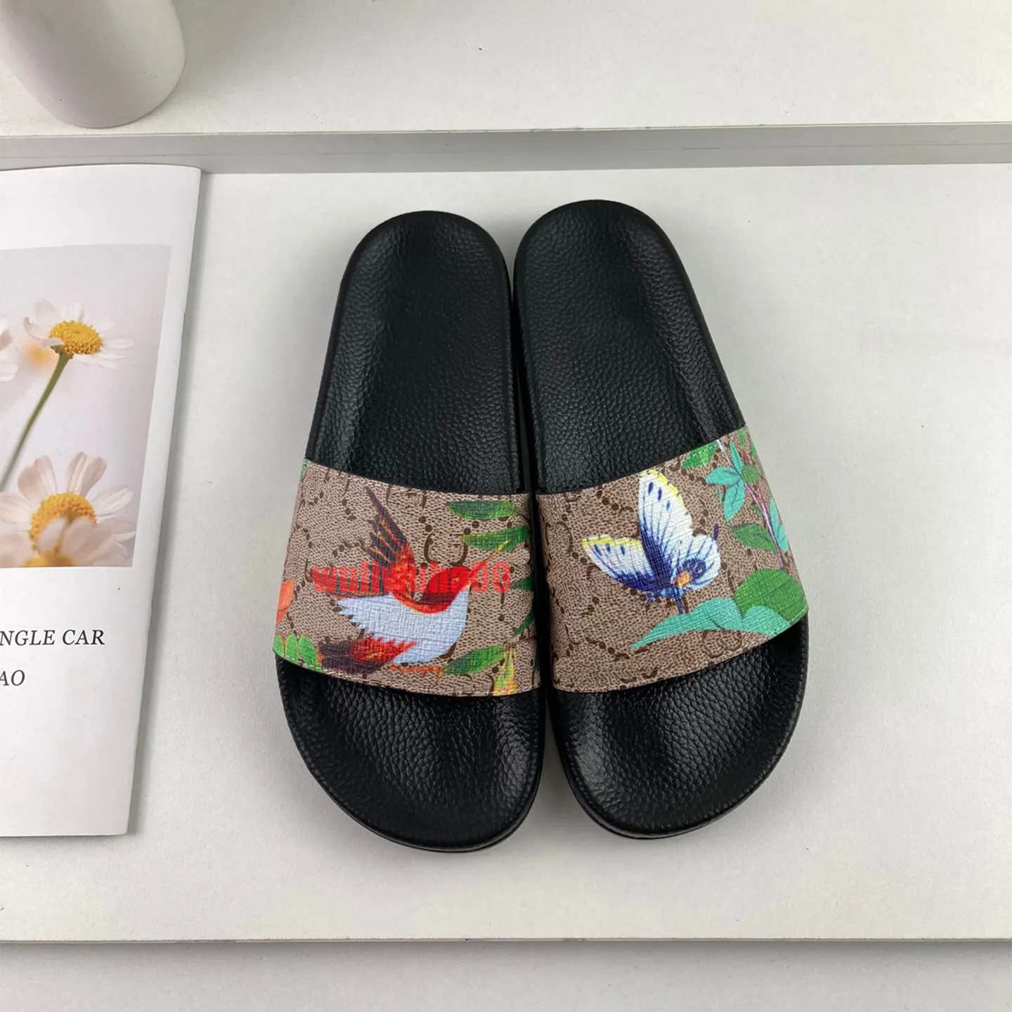 Gucci slides butterfly deals
