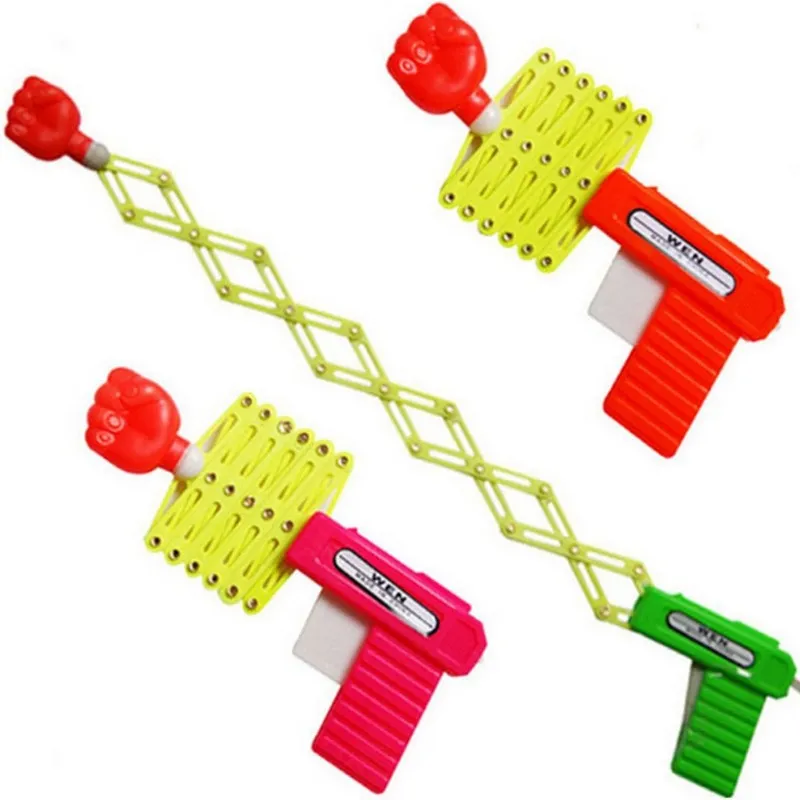 Pugno retrattile Sparatutto Trucco Pistola giocattolo Divertente Scherzo per bambini Giocattoli Bambini Plastica Festival Regalo per divertimento Pugno telescopico elastico classico