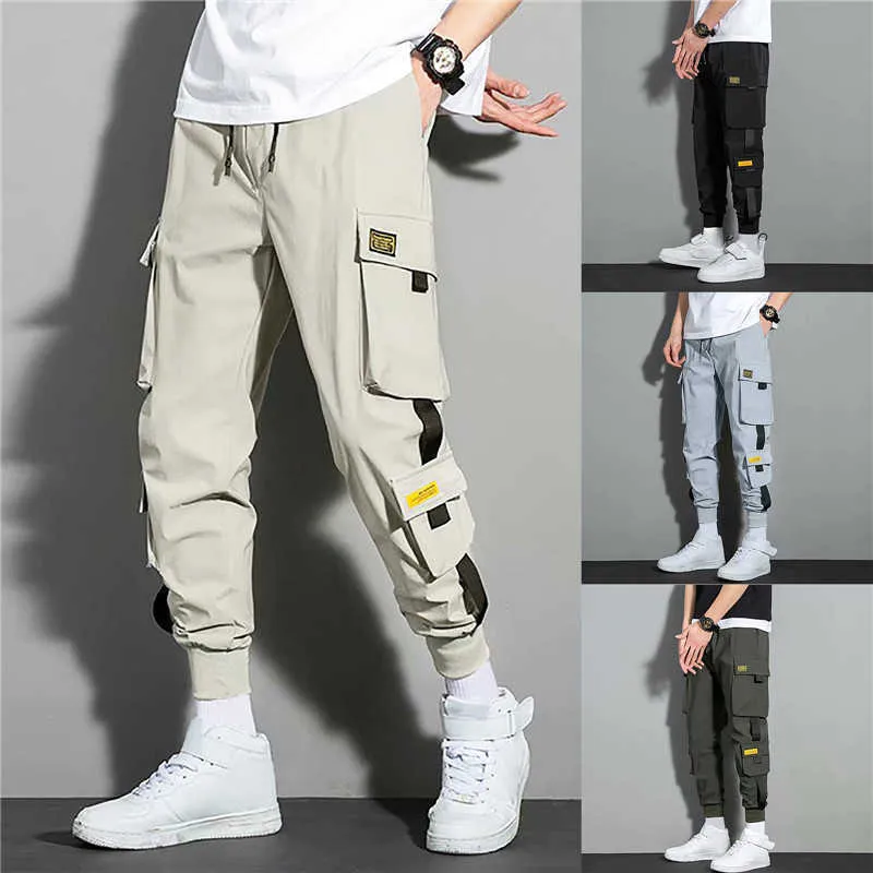 Pants 2023 Spring New Jogger Byxa mäns multi ficklast trånga svettbyxor plus storlek 3XL P230529