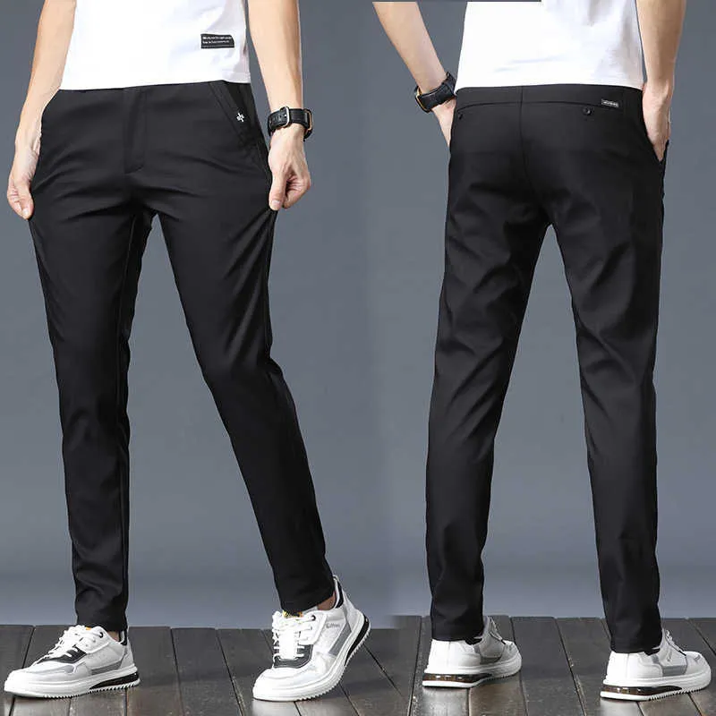 2014 printemps/été pantalon corée du sud décontracté Slim Fit taille élastique classique affaires hommes pantalon noir gris 28-38 P230529