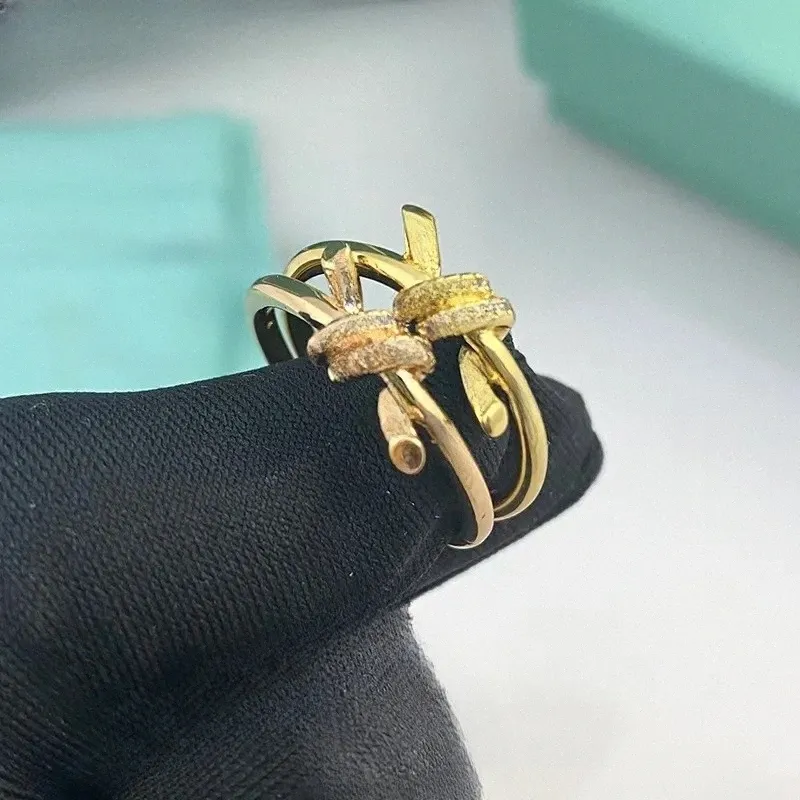 18K chapado en oro diseñador damas cuerda nudo anillo de lujo con diamantes anillos de moda para mujeres joyería clásica rosa boda al por mayor v1Lj #