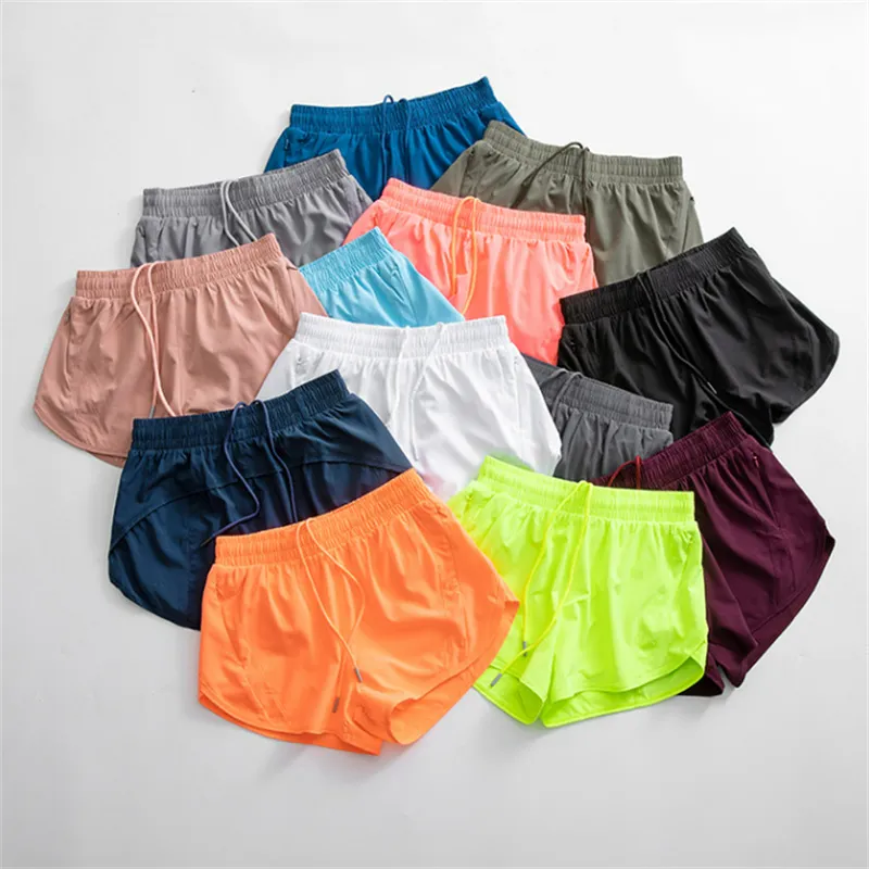 Kvinnor Lululy Yoga Pants Shorts Fitness High midja Slim Snabbt torrt andningsbar hög elasticitet Nylonmaterial Pants Lemon Sports Shorts LL Yoga Outfit