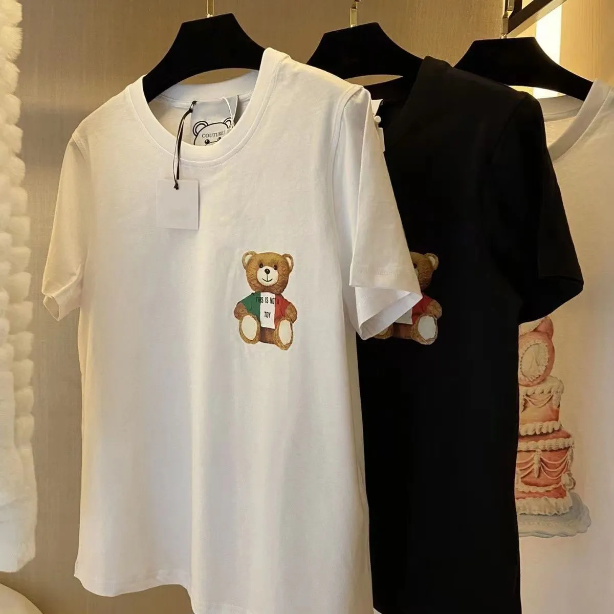 Sommer-Frauen-Trainer-Designer-T-Shirt Lässige Mann-Frauen-T-Shirts mit Teddybär-Buchstaben-Druck mit kurzen Ärmeln Top-Verkauf Luxus-Männer-Hip-Hop-Kleidung