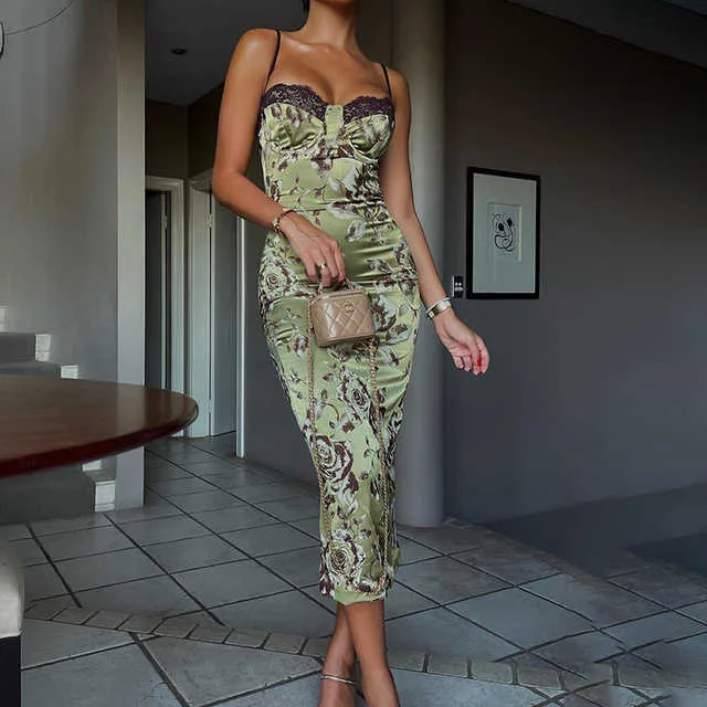 Bloemenprintjurk voor vrouwen 2023 Nieuwe zomer mouwloze riem Backless Slim jurken Fashion vintage midi -jurk