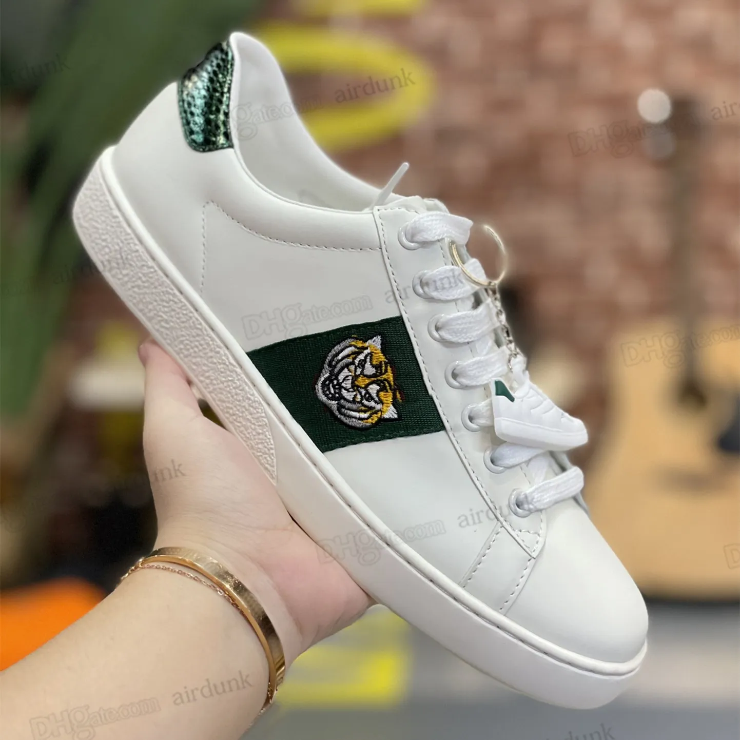 White shoes with green stripes cheap