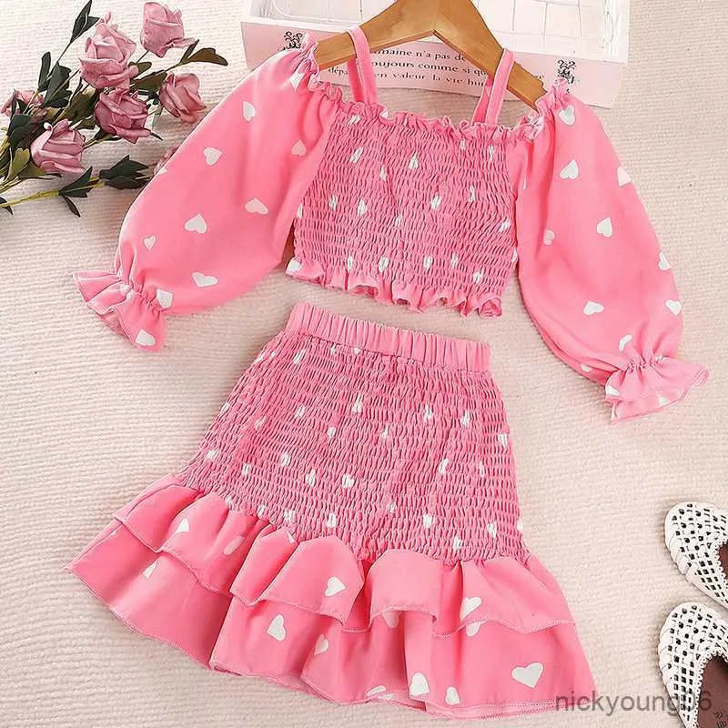 Set di abbigliamento Bambini Abiti casual per ragazze Primavera Estate 2023 Gonne a balze con stampa amore a maniche lunghe Bambini