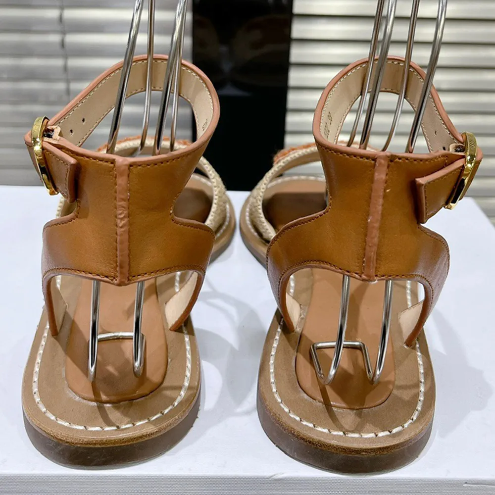 LYMPIAR FLAT STRAP SANDAL IN RAFFIA CALFSKIN BEIGE BLACK TRIOMPHER