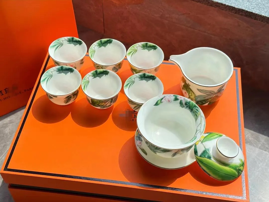 Conjuntos de chá de designer sebo jade conjunto de chá com caixa de presente de alta qualidade seleto jade porcelana conjunto de chá presentes do festival