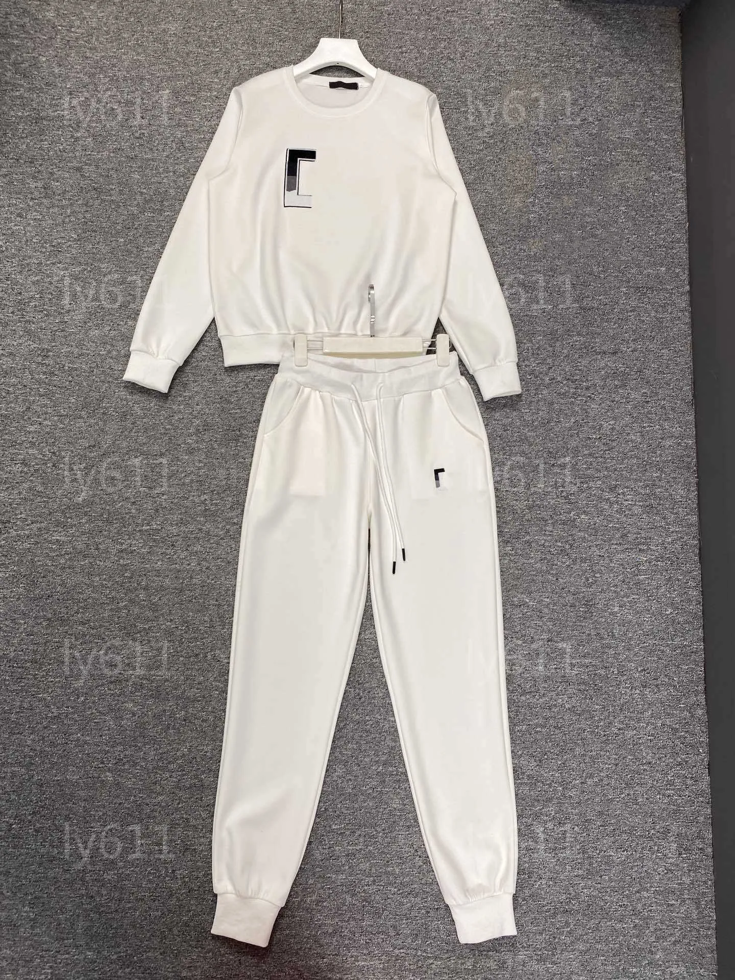 Tute da donna Set Tute Designer Felpa Giacca a maniche lunghe Tute sottili Pantaloni sportivi Tuta da jogging Tuta da jogging Moda Set da 2 pezzi Tute da donna