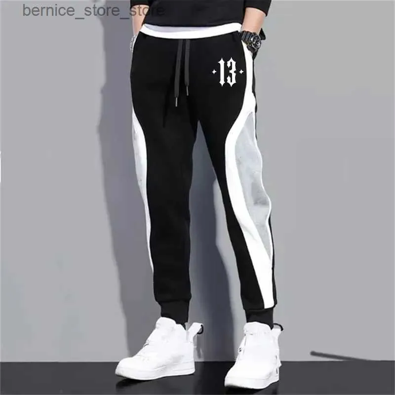 Herrbyxor Herr- och kvinnors avslappnade byxor Svart och grå färgmatchande jogging byxor mode Vuxen Svettbyxor Simple Sports Pants Q231201