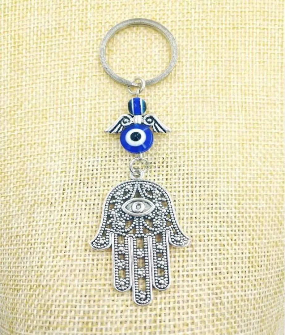Mode-sieraden Blauw Boze Oog Lucky Fatima Hamsa Hand Turkse Boze Oog Charme Bescherming Hanger Kristallen Auto Feng Shui Keychain11527257