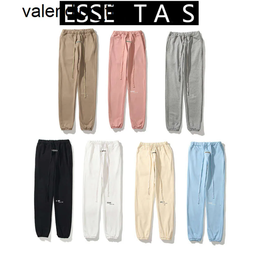 Nouveaux hommes pantalons réfléchissants Silocone lettres imprimer pantalon décontracté concepteur pantalons de survêtement hommes femmes survêtement Couple pantalon