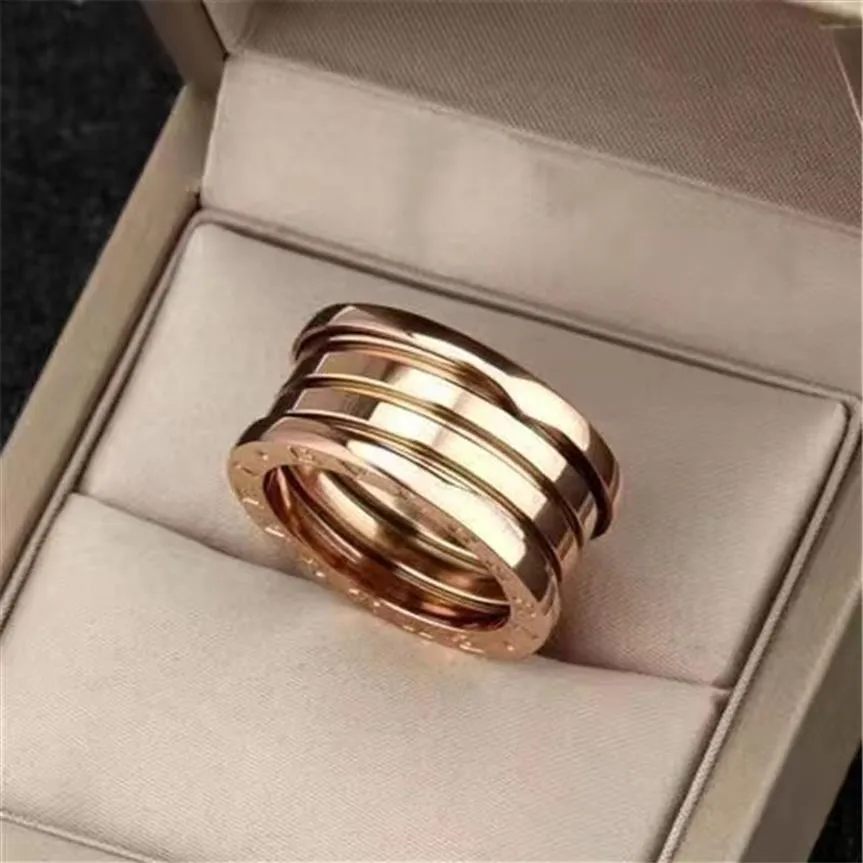 Com caixa moda 316l titânio aço zero anel pedras laterais anéis de casal para homens e mulheres anel de banda 250n