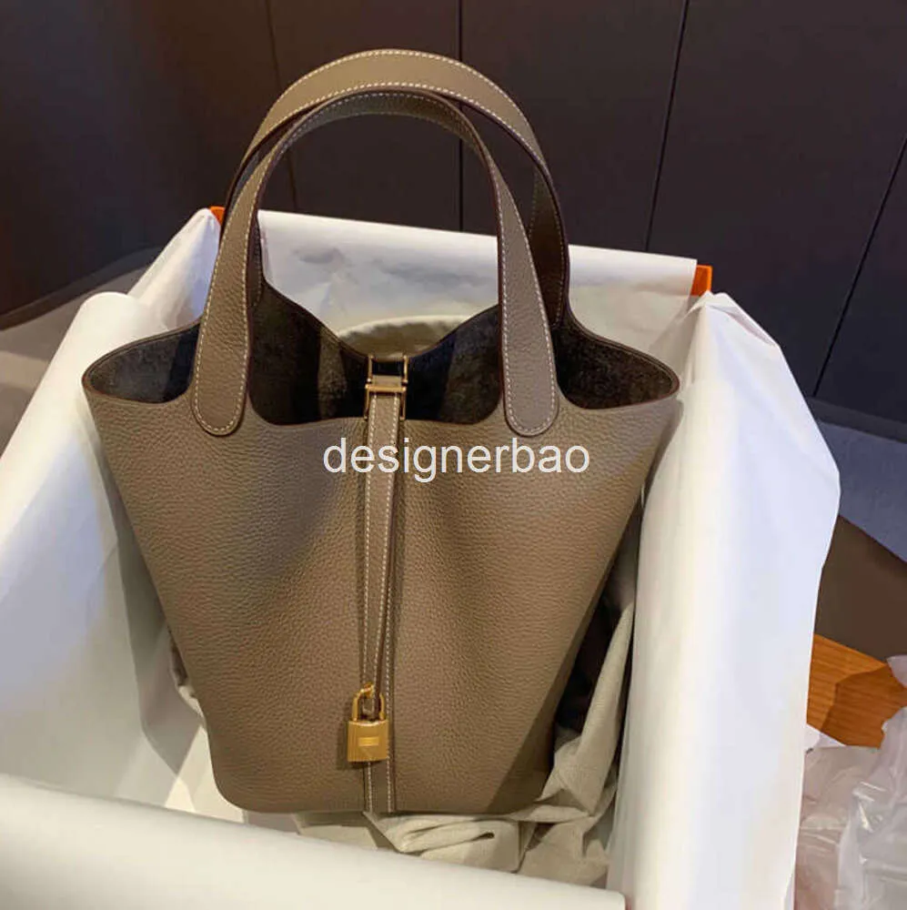 Sac de verrouillage picotin de luxe 2023 Nouveau chaocai panier de chaocai seau à grains litchi doux bucket coréen mère de sac à main