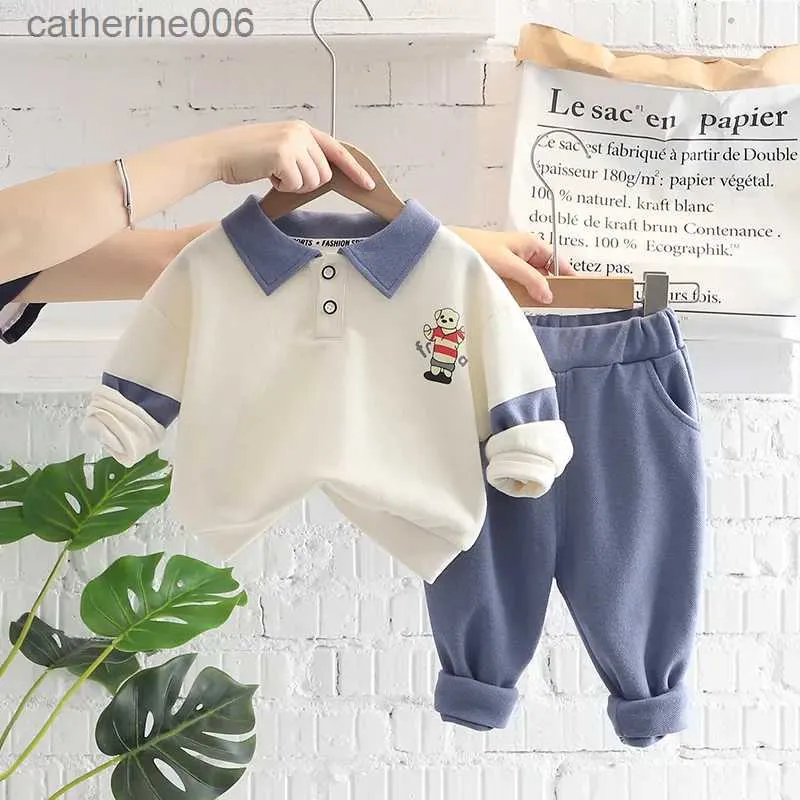 Kläder sätter vårens höst baby pojke boutique spädbarnskläder 2023 koreanska barns tecknad vändvinn krage t-shirts byxor sport två bit setl231202