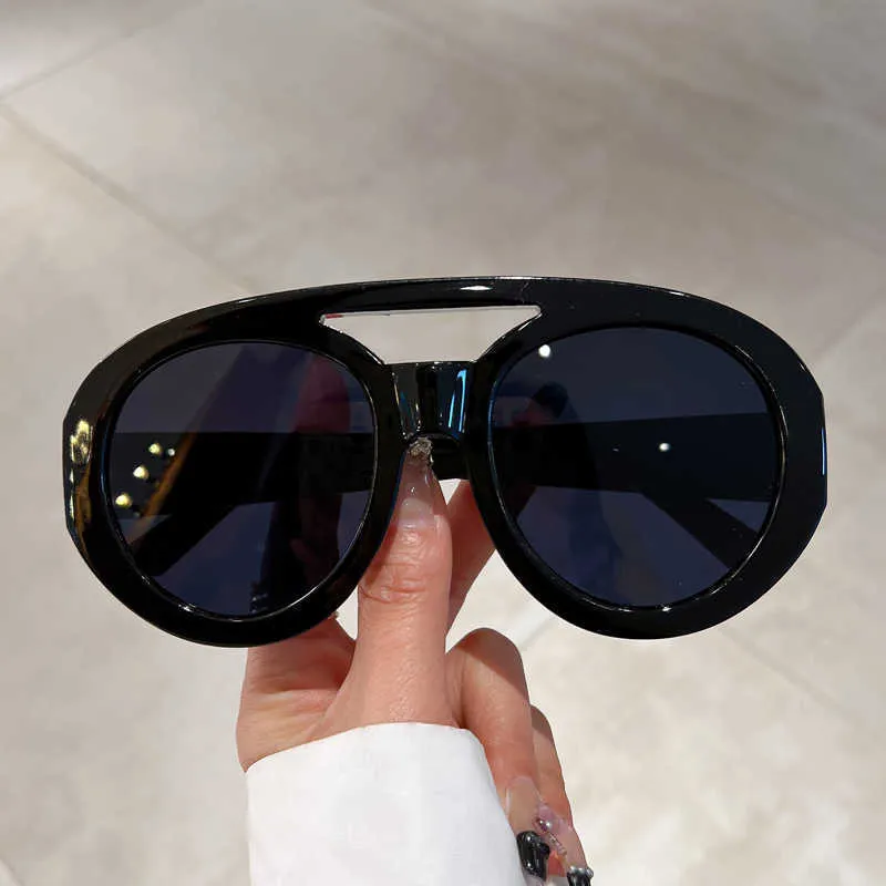 New European and American style retro large frame elliptical double beam design anti strong light sunglasses photo slimming outdoor sunglasses