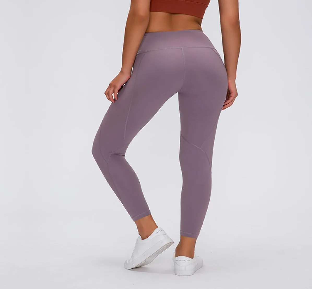 Pantaloni da yoga solidi sportivi classici di moda DTS2018 Al ritmo stretto 25 donne ragazze che corrono leggings fitness pantaloni da donna a 9 punti w1283227