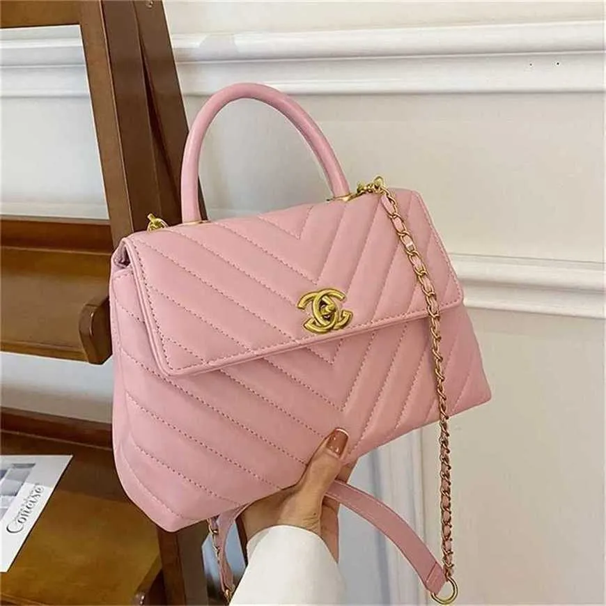 Borsa di design 2024 Nuovo lancio Fresco Dolce Carino Una spalla Palmare Casual Piccola fragranza Età Riducendo Borse di moda e temperamento per le donne