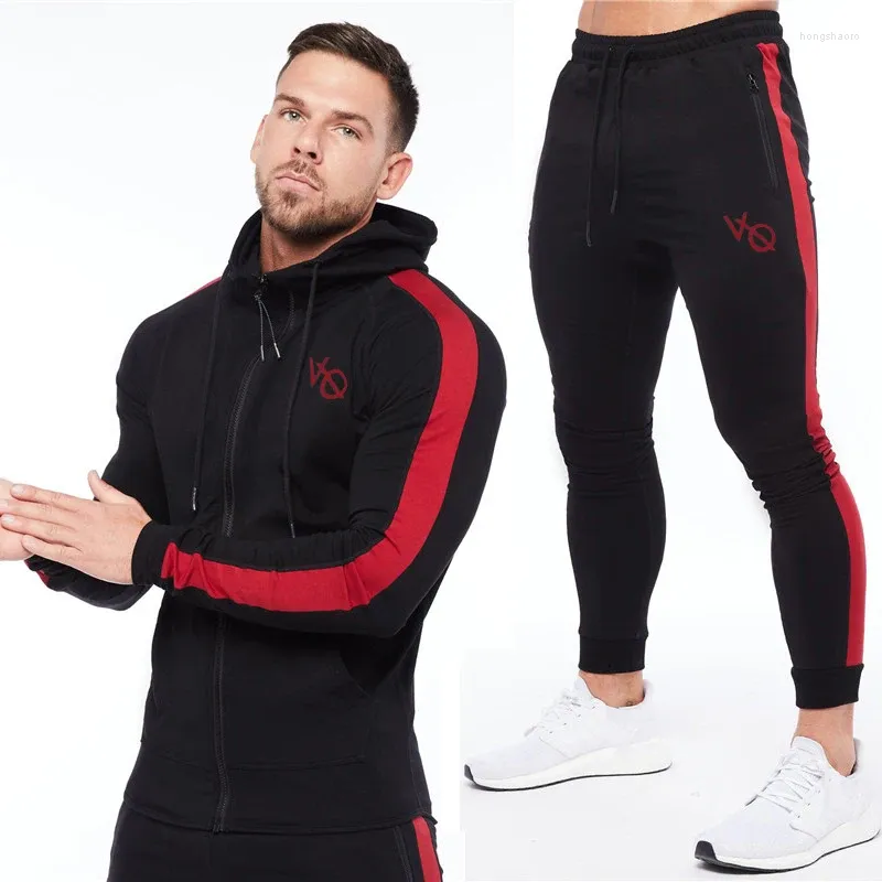 Tute da uomo Tuta da uomo Jogging Palestra Sport Fitness Patchwork in cotone Cardigan stampato Felpa con cappuccio con cerniera Pantaloni sportivi Set a due pezzi