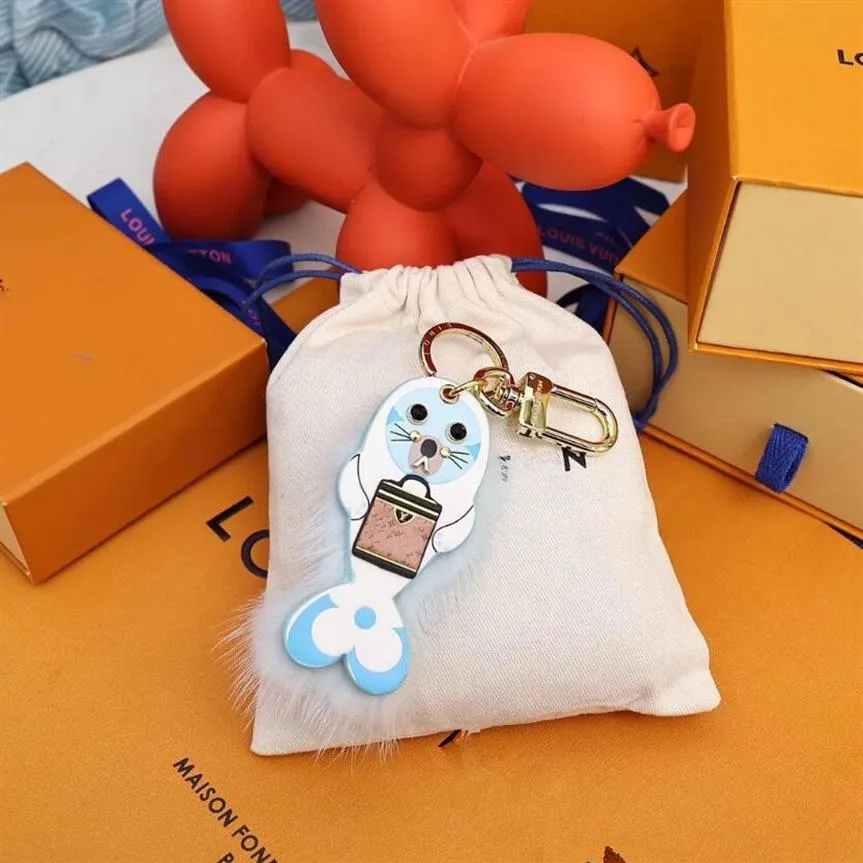 المصمم Collples Sunflower Key Wallet العلامة التجارية الفاخرة Sea Lion Hairball Bag Lage Laggage Pendant Bendant Brand -keychain Women240b