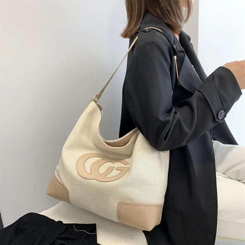 Designer nieuwe canvas enkele schouder Veelzijdige enkele schouder Messenger Tote Grote tas Mama tas grote capaciteit Handtassen Outlet3191