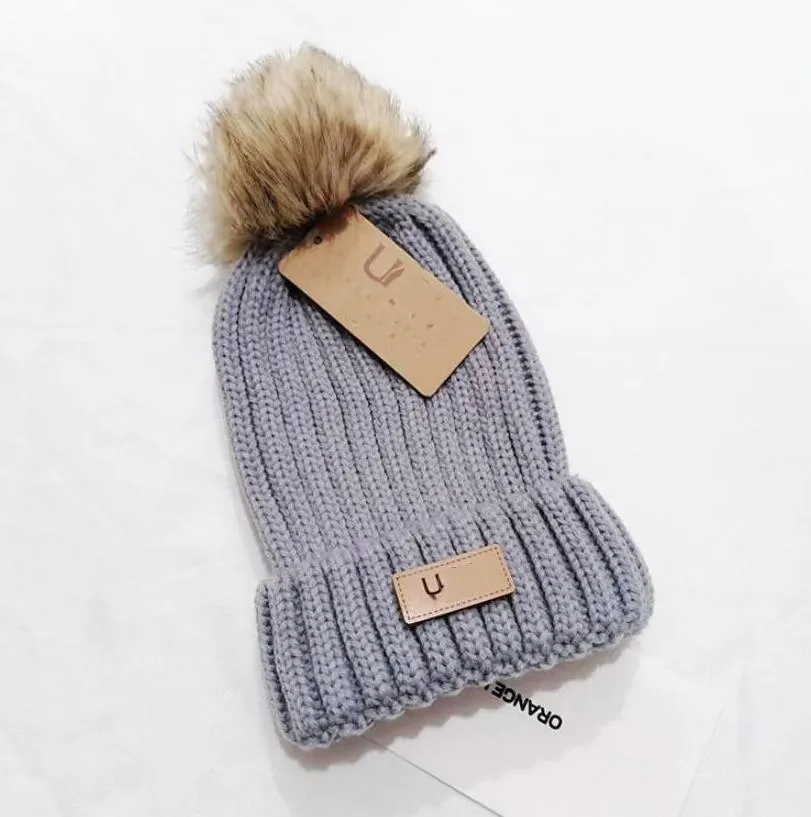 Diseñador Pompones de invierno Gorro de punto Sombrero de lana Mujeres Punto grueso Grueso Cálido Piel sintética Pom Gorros Sombreros Gorro femenino Gorro Gorros de calavera 7 colores