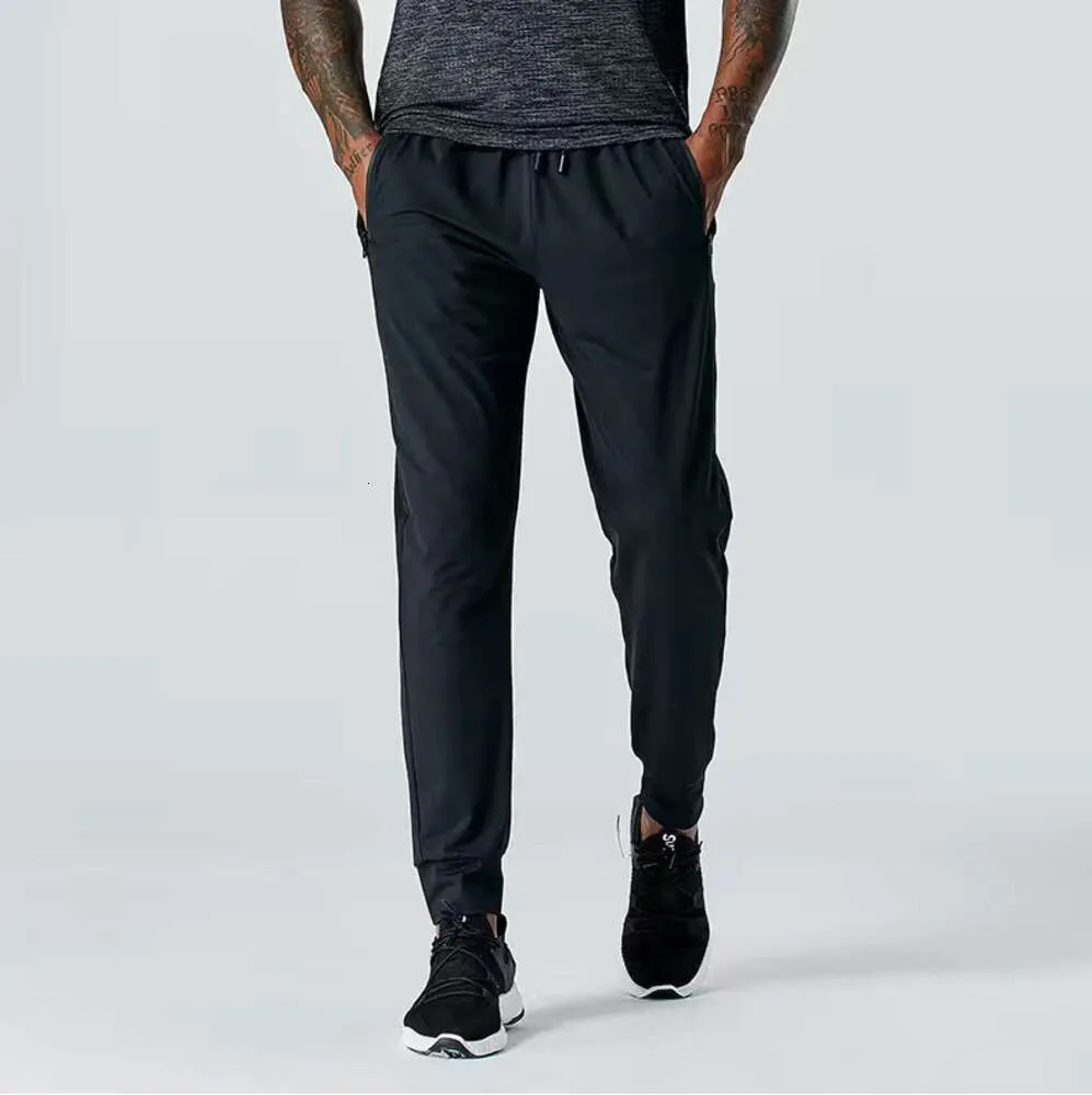 LU LU L Jogger Pantalons longs Sport Yoga Outfit Outdoor City-Sweat Yogo Gym Pockets LL Pantalons de survêtement Pantalons Hommes Casual Taille élastique fitness Vêtements à la mode