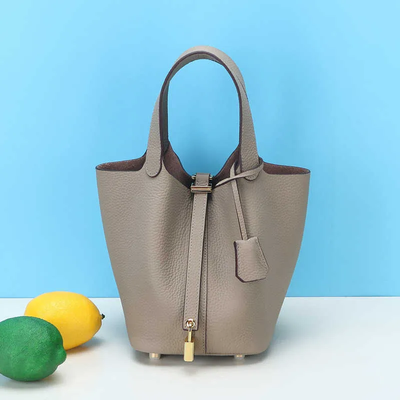 Designer picotin lås väska spänne guld vegetabilisk korgväska kvinnlig hink läder mode mjuk handväska toppskikt ko Cplw