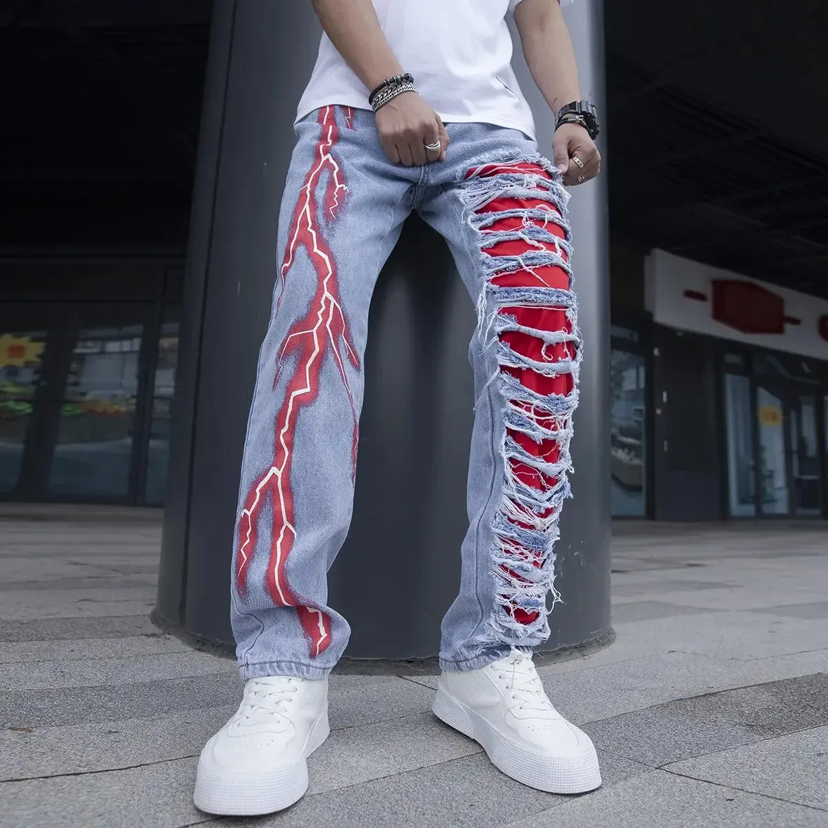 Jeans da donna Uomo Elastico Fulmine Baggy per uomo Cracked Streetwear Fori Strappati Patchwork Denim Pantaloni casual Pantaloni skinny slim 231205