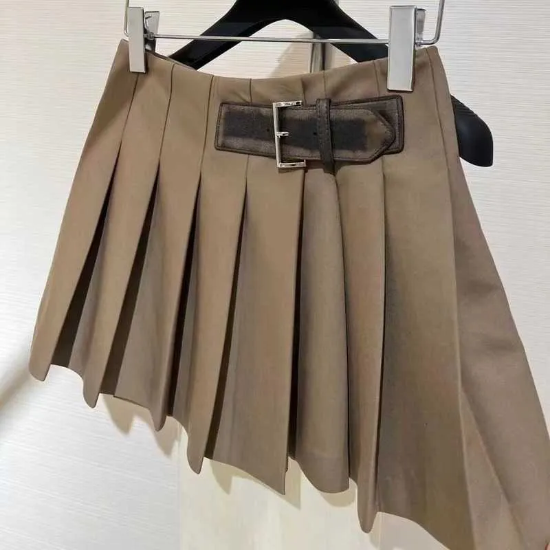 Designer di gonne 2023 Autunno New British Academy Academy Angogated Belt Bishle Skirt Skirt Women's Half Conk