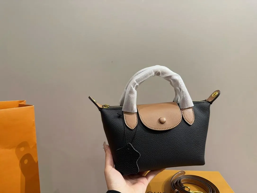 Female purse designers best sale