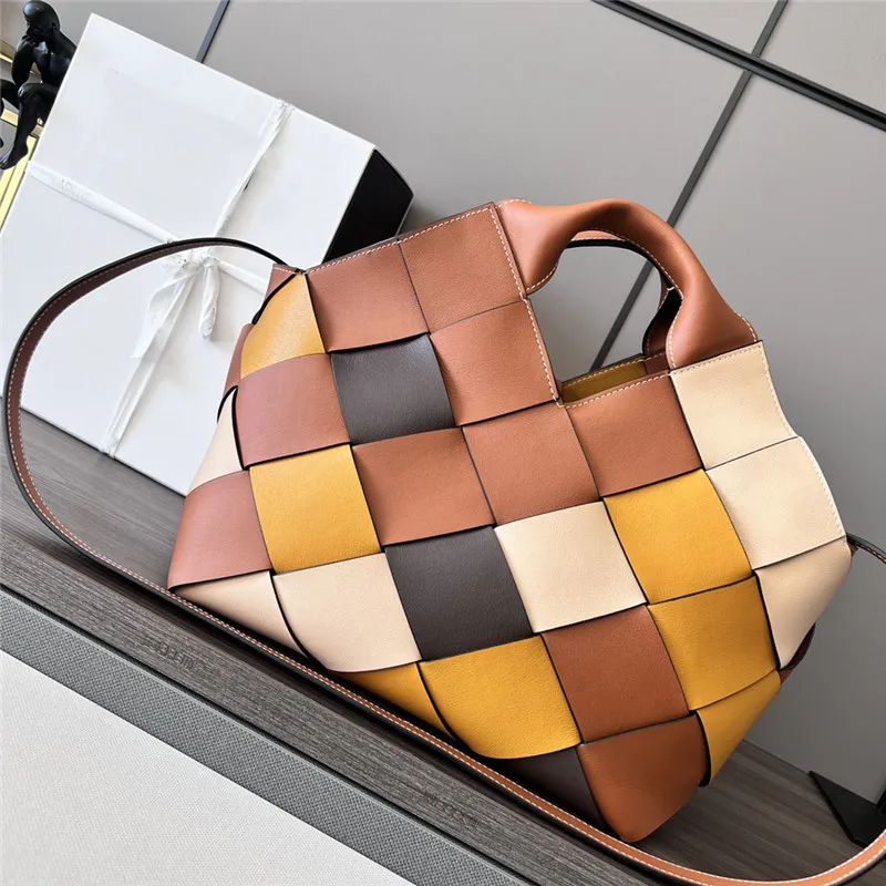 surus leather woven basket handbag features rolled handles lace-up closure Unlined Anagram soft grained cowhide strips embossed size 24 checkerboard 062840