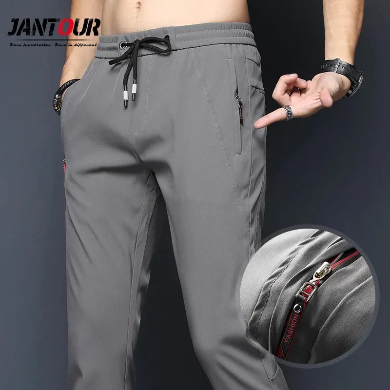 Pantalons pour hommes printemps été décontracté Slim Fit Chinos mode mince poche à glissière taille élastique pantalon à séchage rapide vêtements de marque masculine 231206