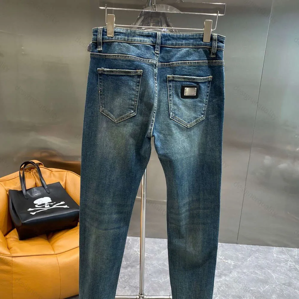 Męskie dżinsy metalowe haft dżinsy projektanta swobodne spodnie myte dżinsowe spodnie mężczyźni kobiety luźne joggingowe spodnie dżinsy dmr8